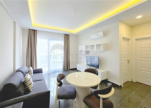 Сучасна квартира 1 + 1 в оренду-комфорт та інфраструктура в центрі Махмутлара