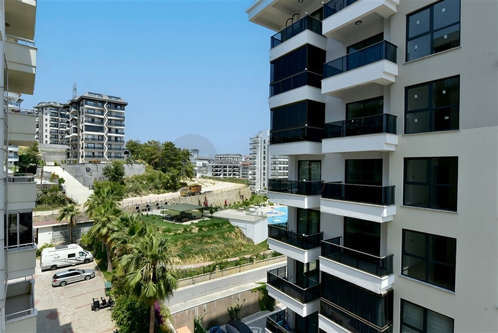  Затишна мебльована квартира з багатою інфраструктурою в мальовничому районі Авсаллар