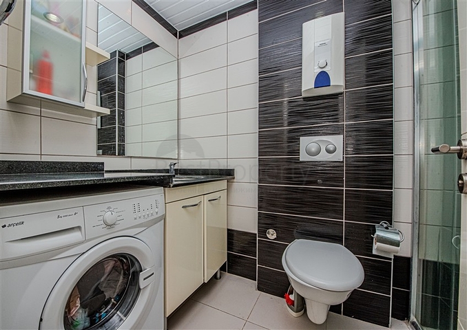  Затишна мебльована квартира з багатою інфраструктурою в мальовничому районі Авсаллар