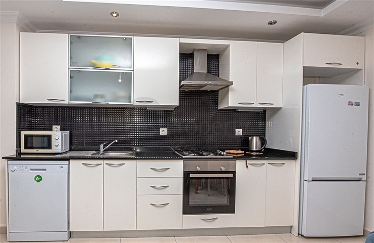  Затишна мебльована квартира з багатою інфраструктурою в мальовничому районі Авсаллар