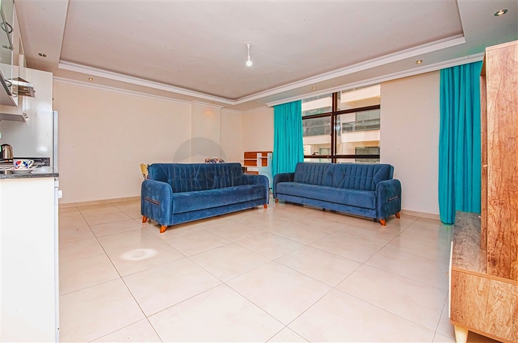  Затишна мебльована квартира з багатою інфраструктурою в мальовничому районі Авсаллар