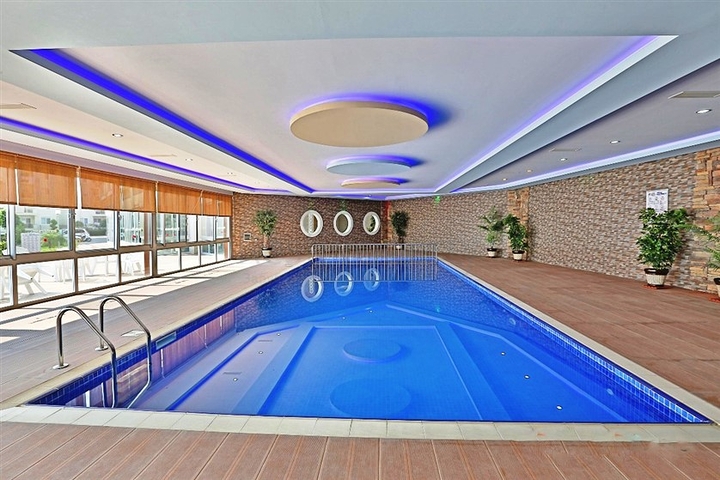  Затишна мебльована квартира з багатою інфраструктурою в мальовничому районі Авсаллар