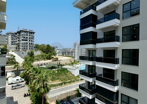  Затишна мебльована квартира з багатою інфраструктурою в мальовничому районі Авсаллар