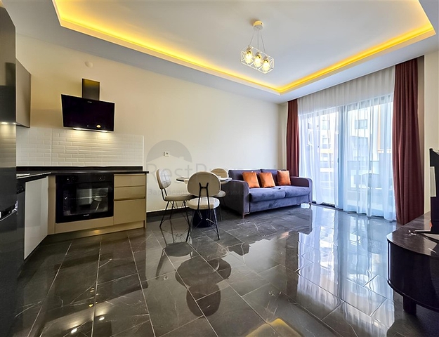 Оренда затишної квартири 1 + 1 з багатою інфраструктурою в самому серці Махмутлара