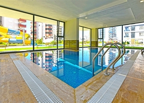 Оренда затишної квартири 1 + 1 з багатою інфраструктурою в самому серці Махмутлара