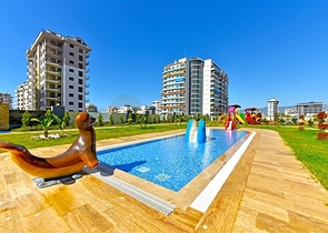 Оренда затишної квартири 1 + 1 з багатою інфраструктурою в самому серці Махмутлара