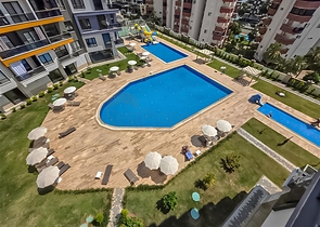 Оренда затишної квартири 1 + 1 з багатою інфраструктурою в самому серці Махмутлара