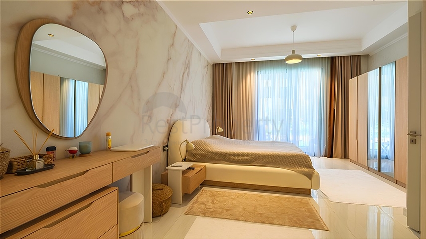 Розкішна квартира 3 + 1 з садом в елітному комплексі біля моря