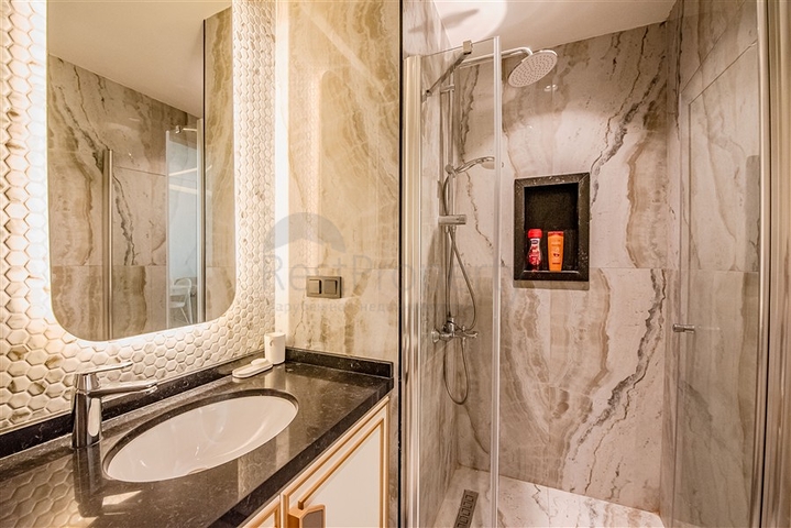 Сучасні апартаменти 1+1 в самому центрі Аланії з повною інфраструктурою