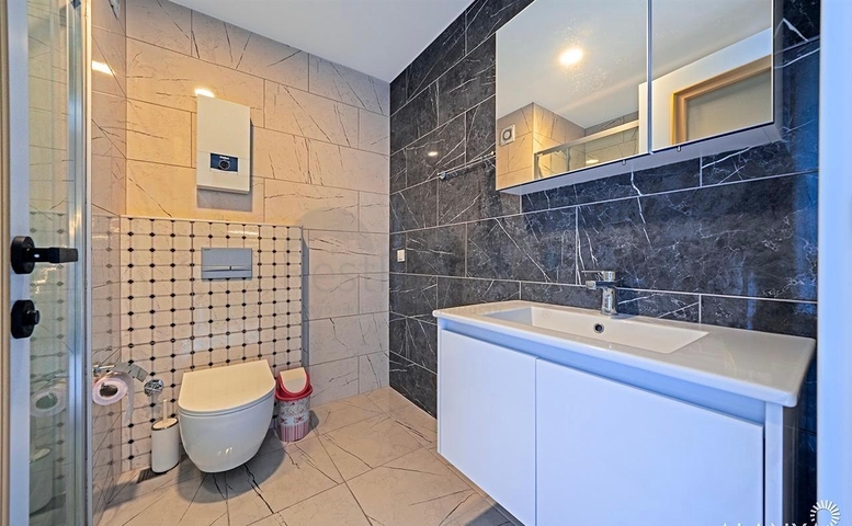 Простора мебльована квартира 3+1 в сучасному житловому комплексі в Авсалларі