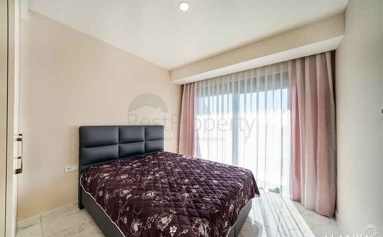 Простора мебльована квартира 3+1 в сучасному житловому комплексі в Авсалларі