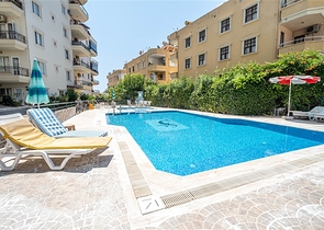 Затишна мебльована квартира 2 + 1 поруч з пляжем в районі Тосмур