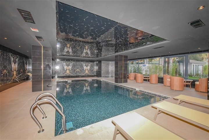 Сучасна квартира 1 + 1 в новому комплексі з видом на море в центрі Аланії