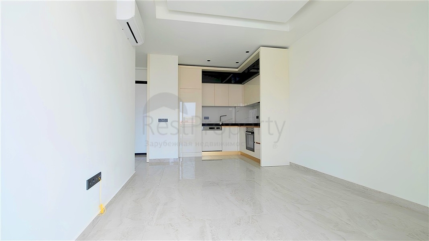 Сучасна квартира 1 + 1 в новому комплексі з видом на море в центрі Аланії