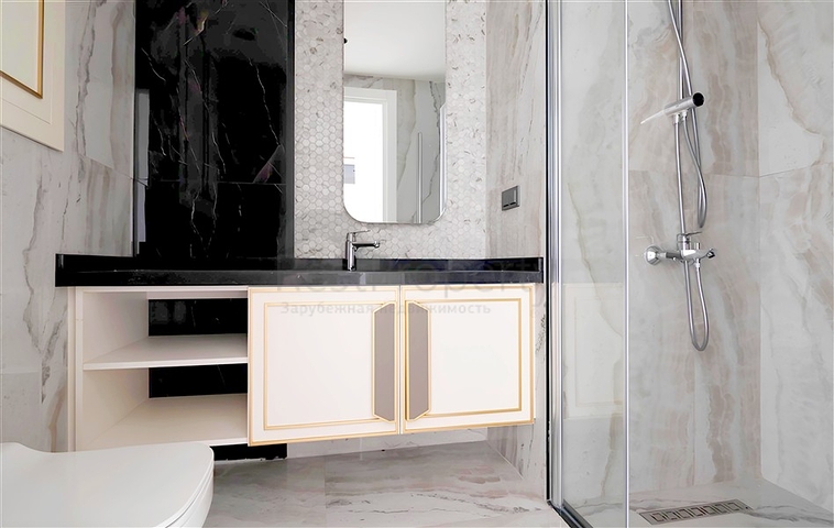 Сучасна квартира 1 + 1 в новому комплексі з видом на море в центрі Аланії