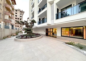 Сучасна квартира 1 + 1 в новому комплексі з видом на море в центрі Аланії