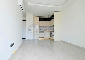 Сучасна квартира 1 + 1 в новому комплексі з видом на море в центрі Аланії