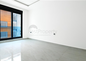 Простора квартира 2 + 1 в новому комплексі з видом на море в центрі Аланії