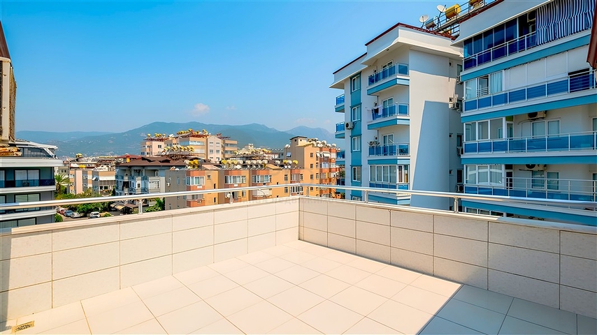 Простора квартира 4 + 1 в районі Оба - для комфортного життя біля моря