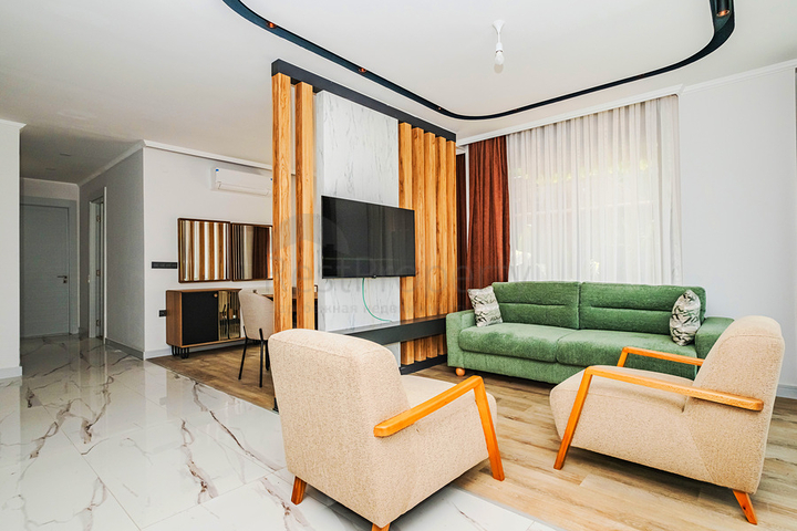 Сучасна квартира з садом біля моря в мальовничому районі