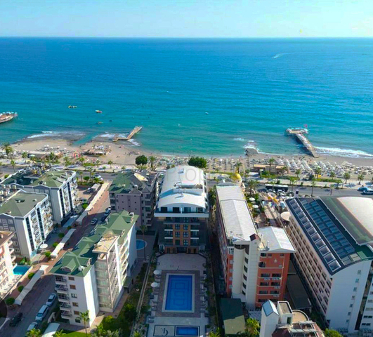 Квартира 2 + 1 з прямою близькістю до моря в районі Оба