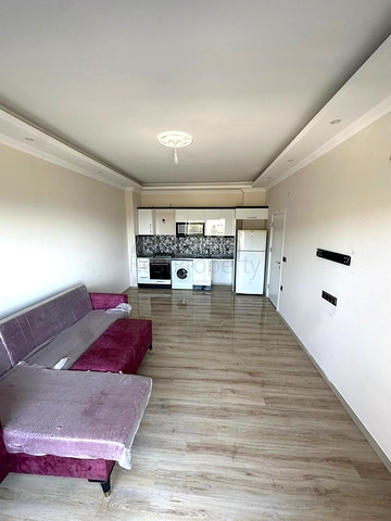 Сучасна квартира 1 + 1 з видом на море в Демірташі