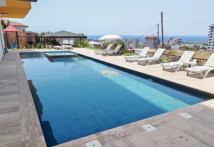 Сучасна квартира 1 + 1 з видом на море в Демірташі