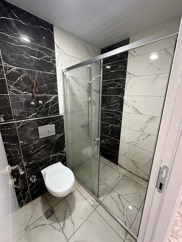 Сучасна квартира 1 + 1 з видом на море в Демірташі