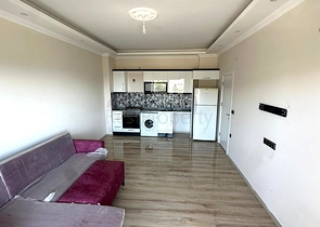 Сучасна квартира 1 + 1 з видом на море в Демірташі