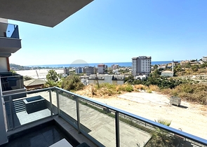 Сучасна квартира 1 + 1 з видом на море в Демірташі