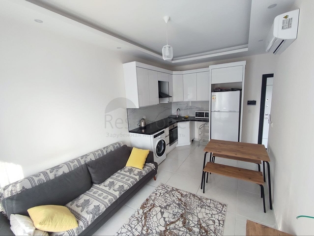 Затишна квартира 1 + 1 в оренду в Махмутларі