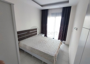 Затишна квартира 1 + 1 в оренду в Махмутларі