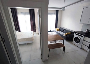 Затишна квартира 1 + 1 в оренду в Махмутларі