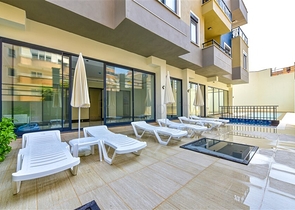 Затишна квартира 1 + 1 в оренду в Махмутларі