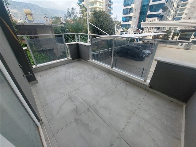 Затишна квартира 2 + 1 в сучасному комплексі в Махмутларі