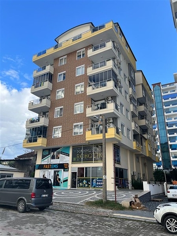 Затишна квартира 2 + 1 в сучасному комплексі в Махмутларі