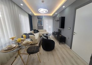 Затишна квартира 2 + 1 в сучасному комплексі в Махмутларі