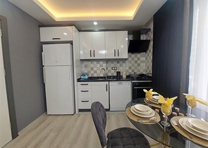 Затишна квартира 2 + 1 в сучасному комплексі в Махмутларі