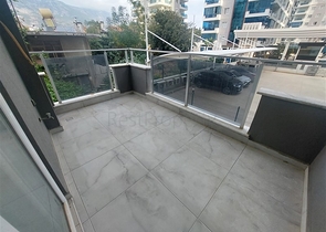 Затишна квартира 2 + 1 в сучасному комплексі в Махмутларі