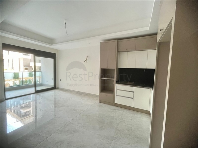 Сучасна квартира 1 + 1 в новому комплексі з басейном і спа-зоною в Махмутларі