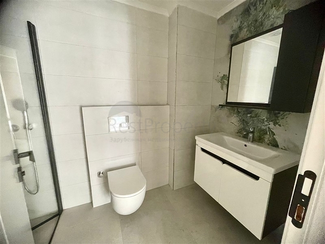 Сучасна квартира 1 + 1 в новому комплексі з басейном і спа-зоною в Махмутларі