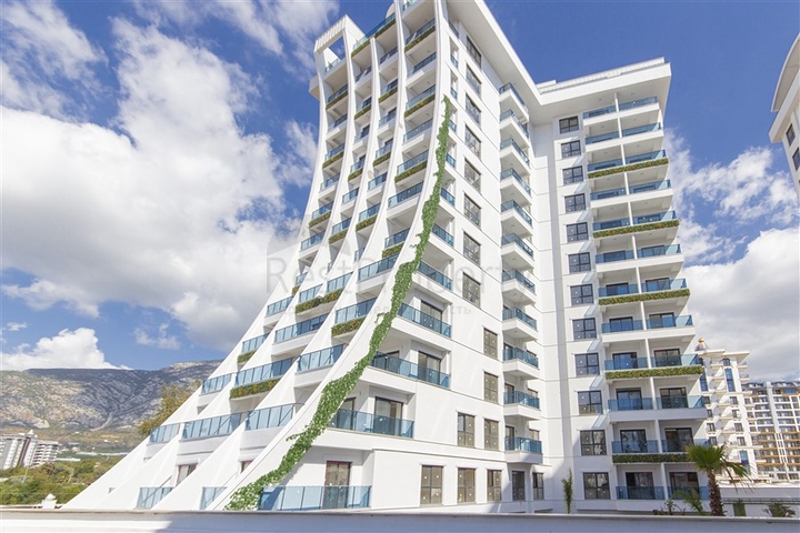 Сучасна квартира 1 + 1 в новому комплексі з басейном і спа-зоною в Махмутларі