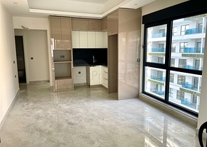 Сучасна квартира 1 + 1 в новому комплексі з басейном і спа-зоною в Махмутларі