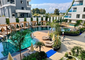 Сучасна квартира 1 + 1 в новому комплексі з басейном і спа-зоною в Махмутларі