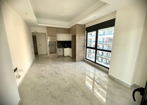 Сучасна квартира 1 + 1 в новому комплексі з басейном і спа-зоною в Махмутларі