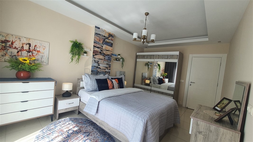 Світла квартира 1+1 в крокової доступності від моря в районі Оба