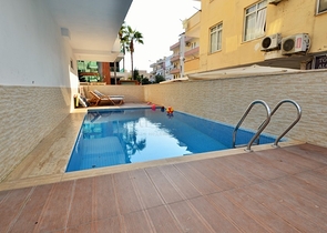 Світла квартира 1+1 в крокової доступності від моря в районі Оба