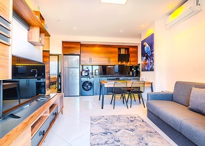 Сучасна квартира з повною інфраструктурою в Махмутларі