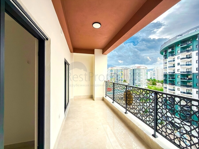 Простора квартира з сучасним дизайном в Махмутларі