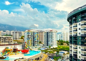 Простора квартира з сучасним дизайном в Махмутларі